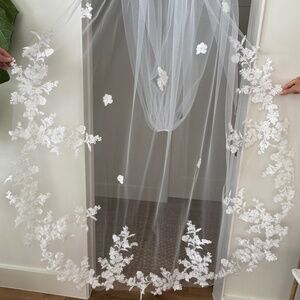 White cathedral-length wedding veil